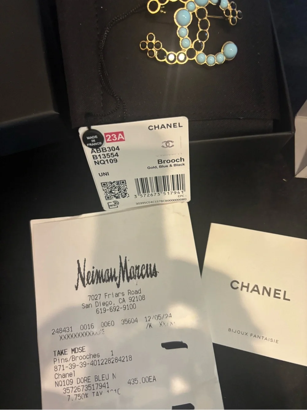 CHANEL Gold Brooch with Light Blue and Black Accents